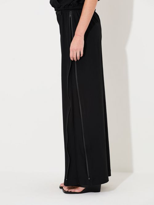 CALÇA EM NYLON COM ZIPER LATERAL